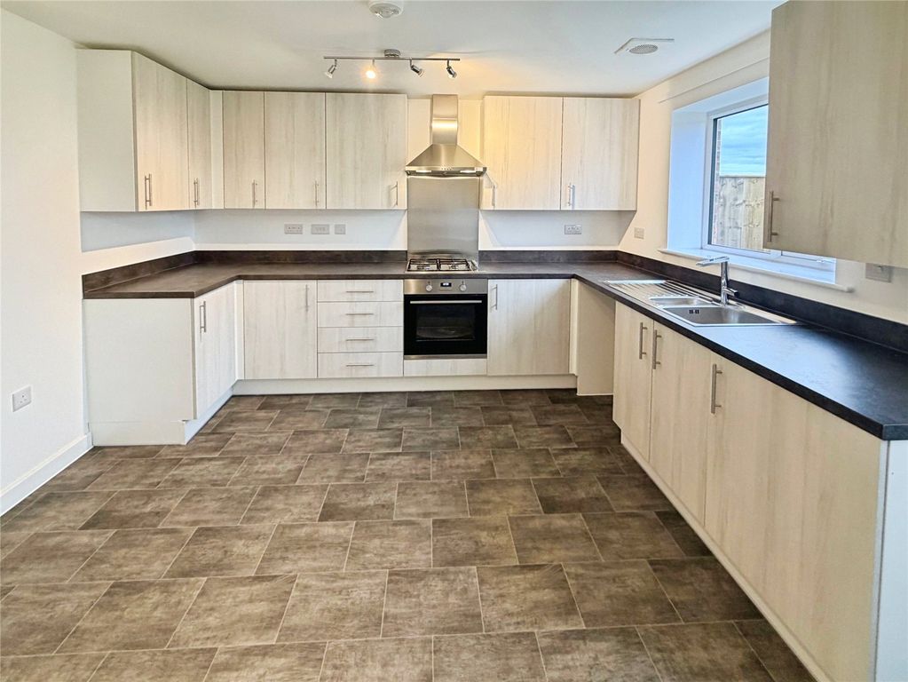 Property photo 2 of 12 Kitchen