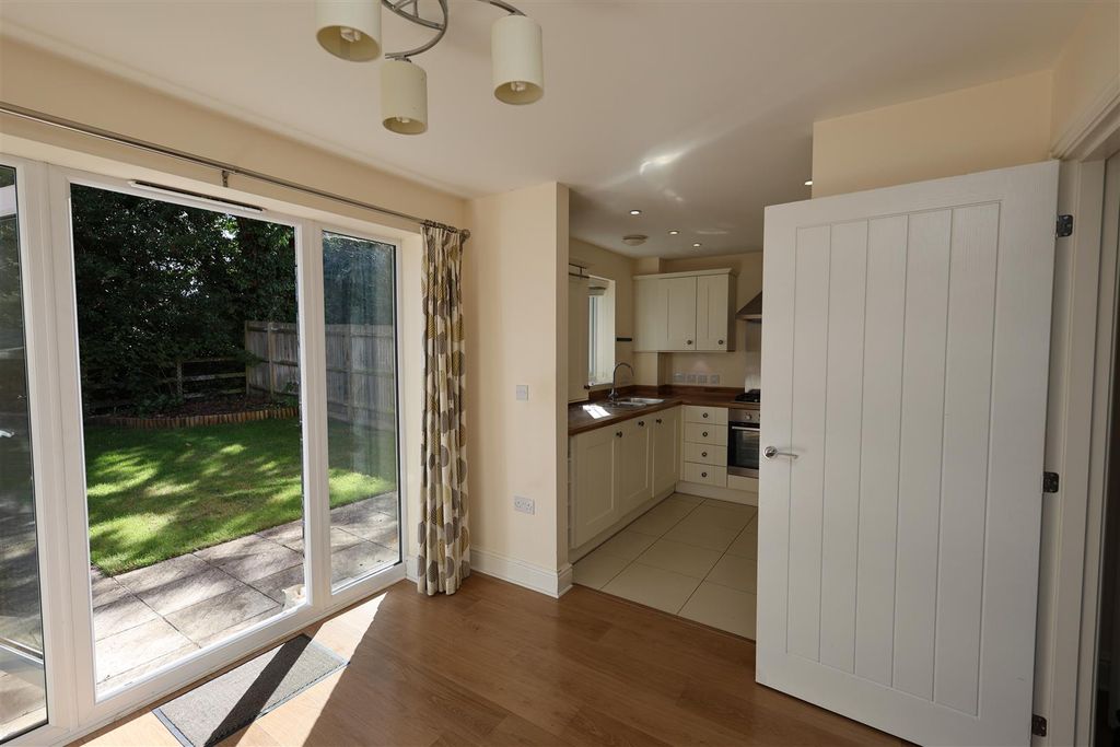 Property photo 3 of 16 Dining Room And Kitchen