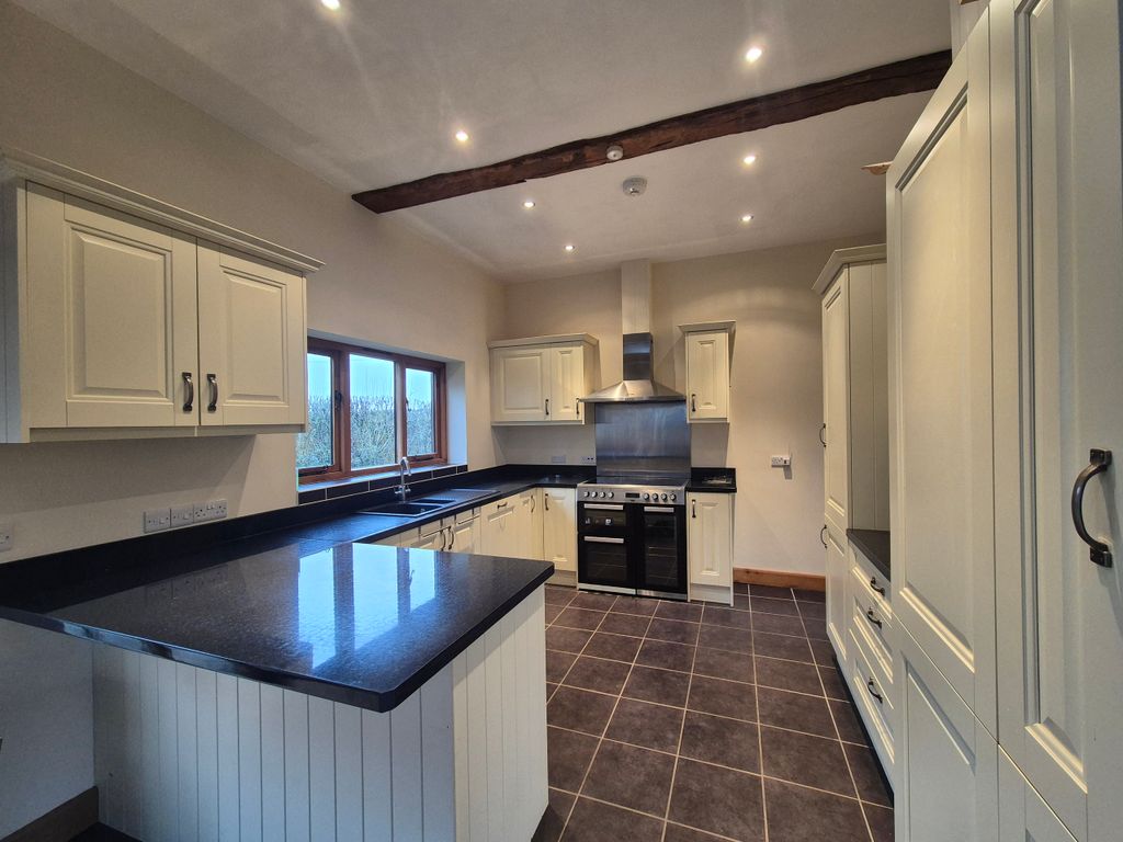 Property photo 3 of 13 Kitchen