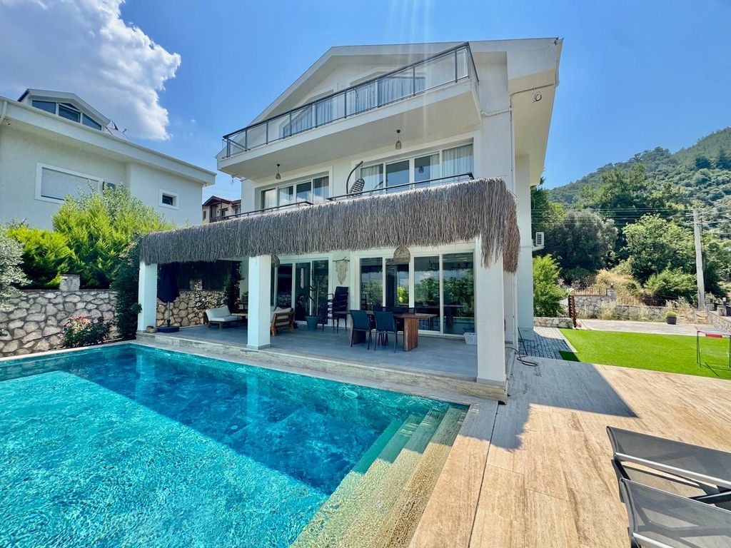 Property photo 2 of 25 Upscale Detached Villa In Fethiye For Sale - Main View Of The Villa And Infinity Pool