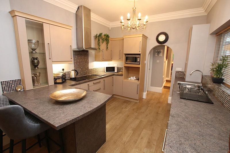 Property photo 3 of 18 Kitchen Area