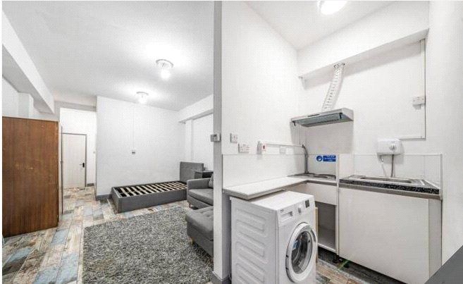 Property photo 3 of 8 Bedroom/Kitchen