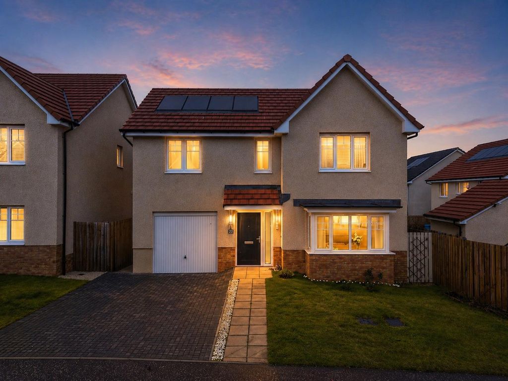 Property photo 1 of 21 22 Adam Crescent Twilight.Jpg