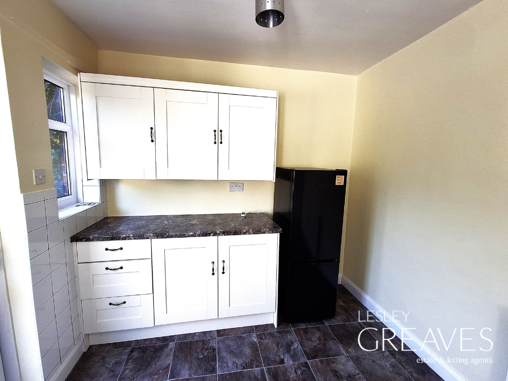 Property photo 3 of 9 Kitchen One