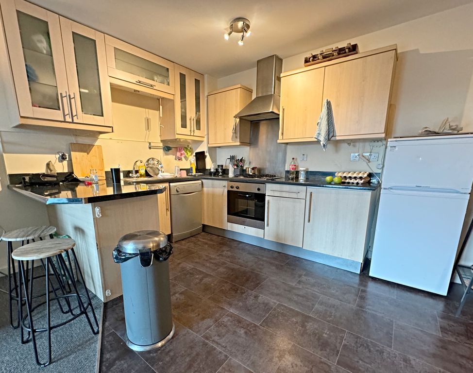 Property photo 3 of 12 Kitchen