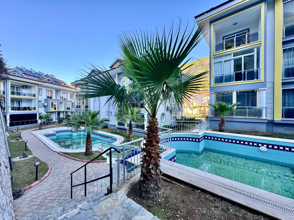 Property photo 2 of 23 A Sprawling 5-Bedroom Duplex Property For Sale In Fethiye – Communal Pools And Social Landscaped Gardens