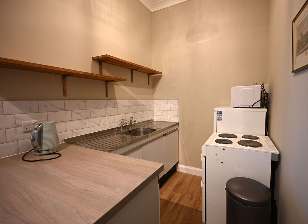 Property photo 2 of 8 Kitchen