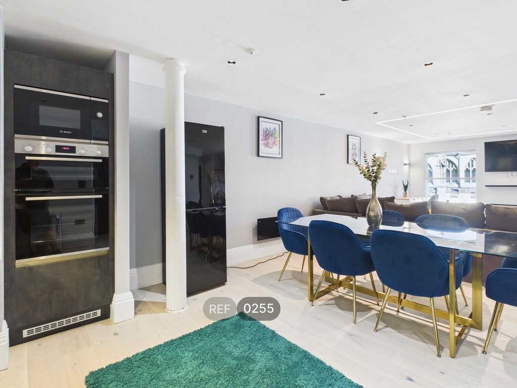 Property photo 2 of 26 Kitchen / Living Area