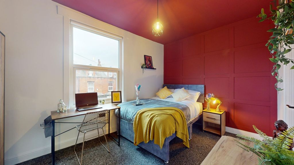 Property photo 3 of 12 This Cozy Double Bedroom Features A Comfortable Be...