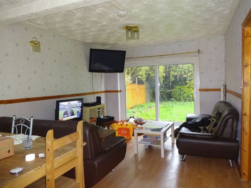 Property photo 2 of 12 Living Area