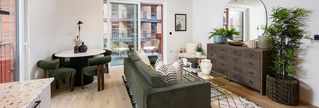 Property photo 2 of 6 Living Space In Foreground, Dining Table And Balcony Doors In Background.