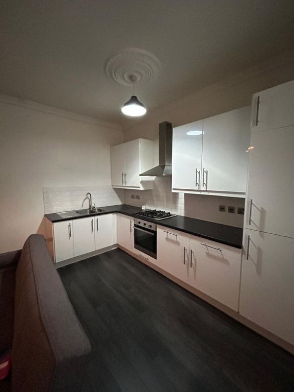 Property photo 3 of 8 Kitchen