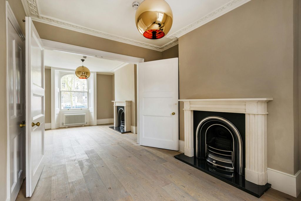 Property photo 2 of 13 Living Area