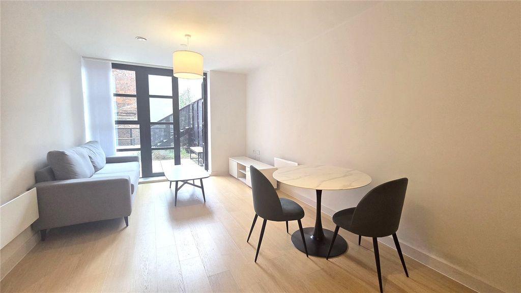 Property photo 3 of 12 Living Space 2
