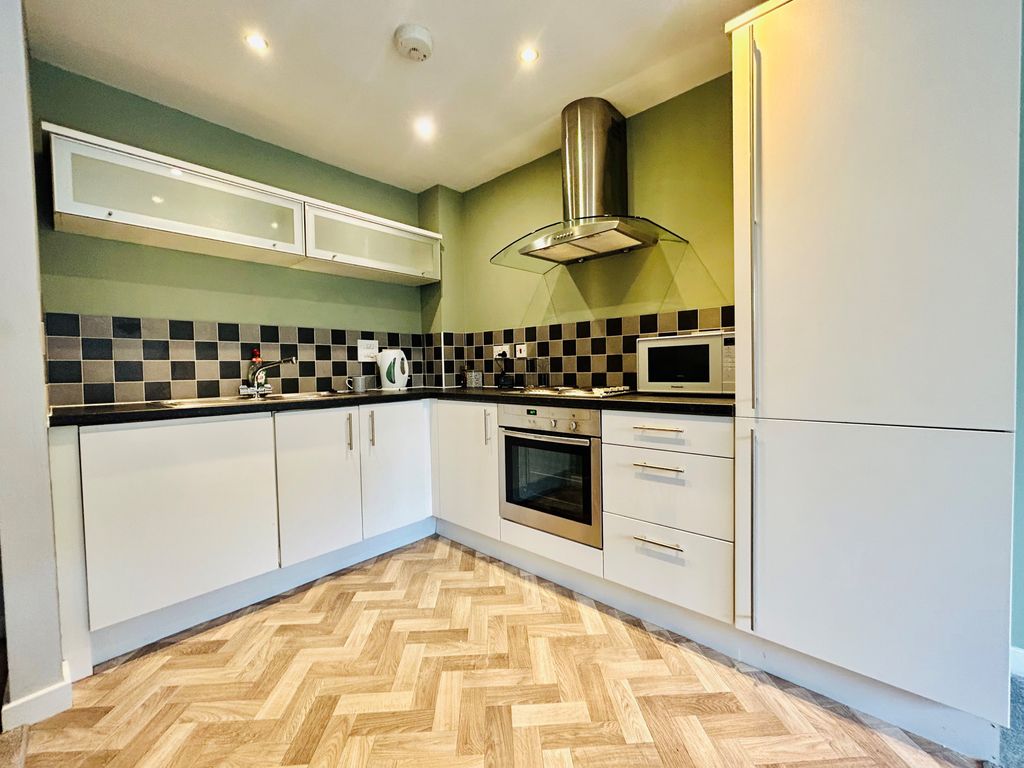 Property photo 2 of 8 Kitchen