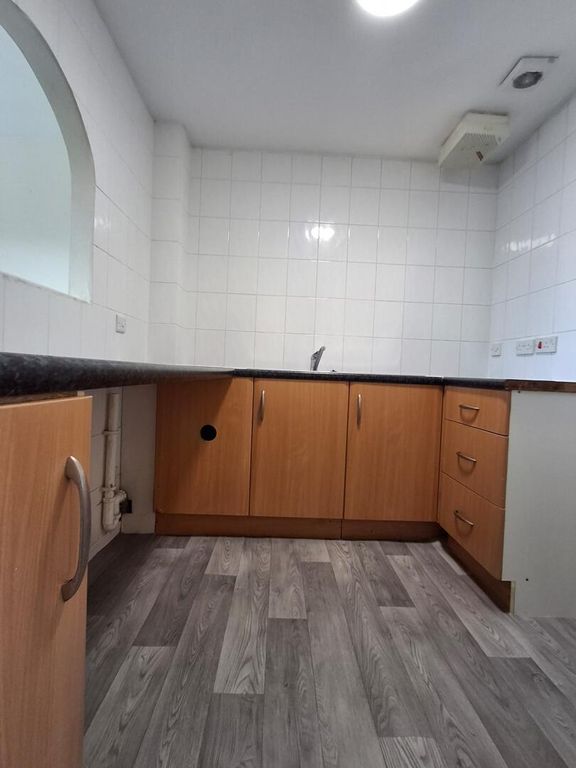 Property photo 3 of 12 Kitchen