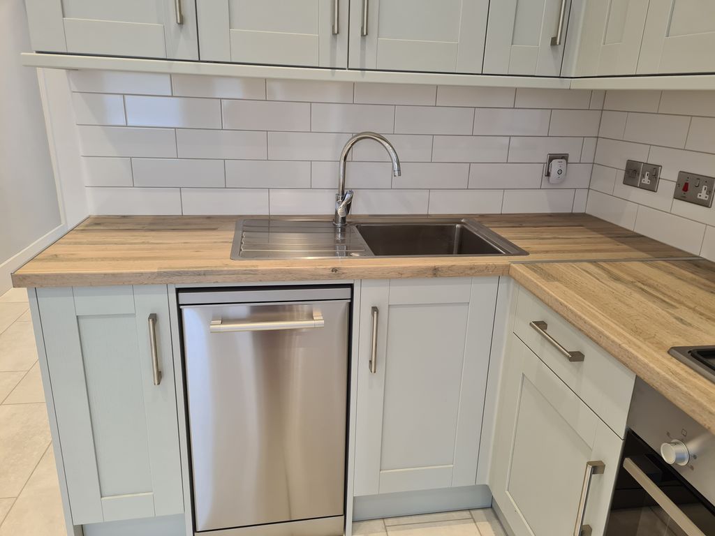 Property photo 3 of 8 Front