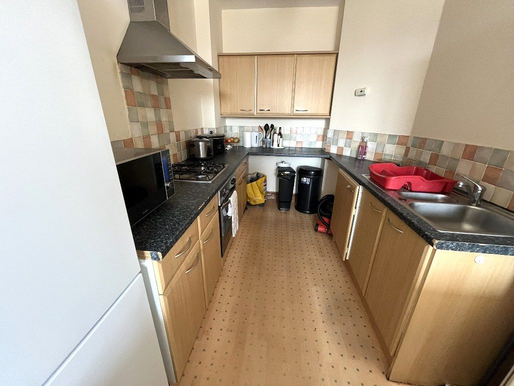 Property photo 3 of 6 Kitchen Area