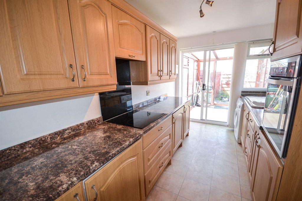 Property photo 3 of 12 Kitchen