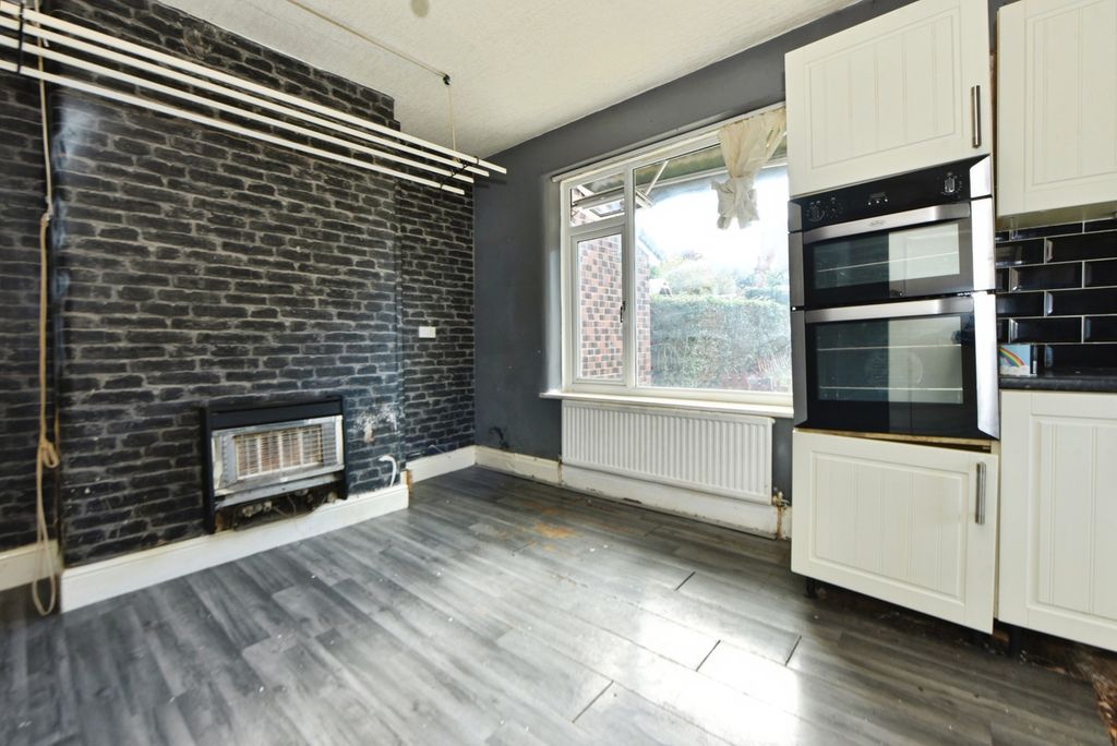 Property photo 3 of 13 Dining Kitchen