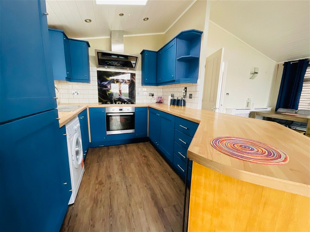 Property photo 3 of 13 Kitchen Area