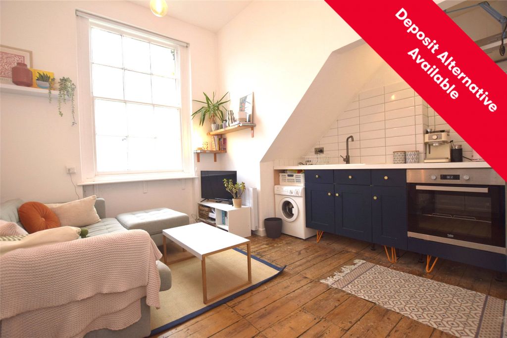 Property photo 1 of 9 Kitchen/Living Area