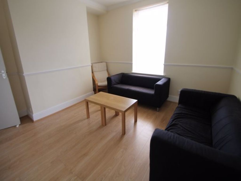 Property photo 2 of 32 A Well-Lit, Tidy Living Room Featuring Two Comfort...