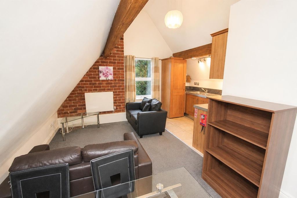 Property photo 2 of 10 Charming Loft Living Area With Exposed Brickwork...