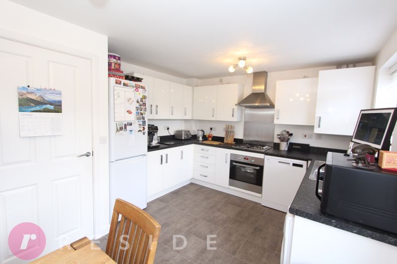 Property photo 3 of 14 Dining Kitchen