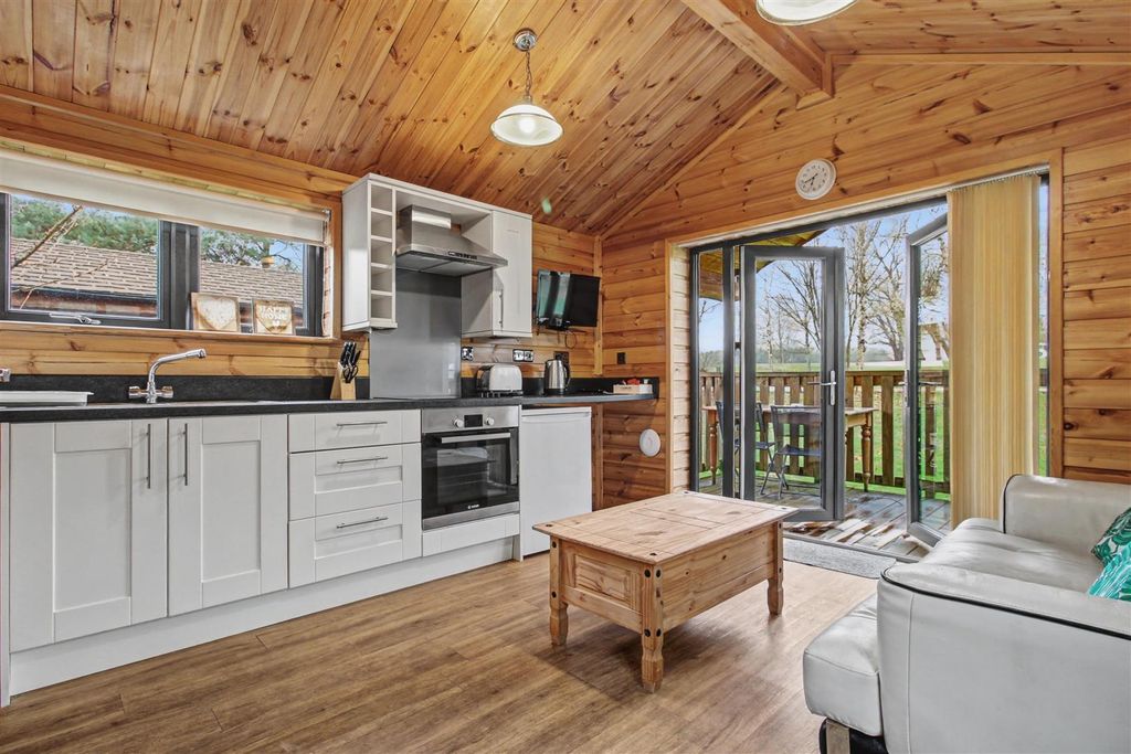 Property photo 2 of 14 Kitchen Living