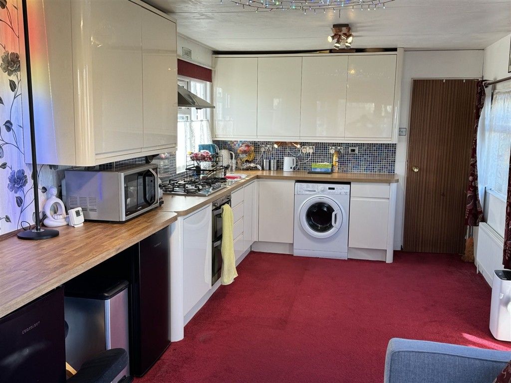 Property photo 2 of 6 Kitchen Area