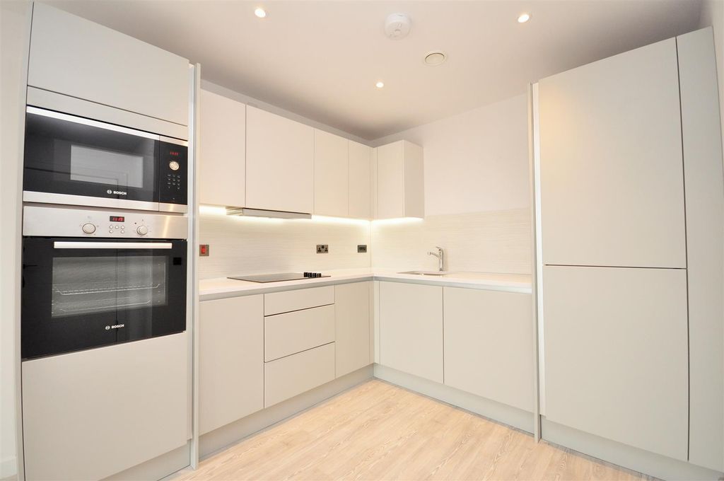 Property photo 2 of 8 Kitchen Area