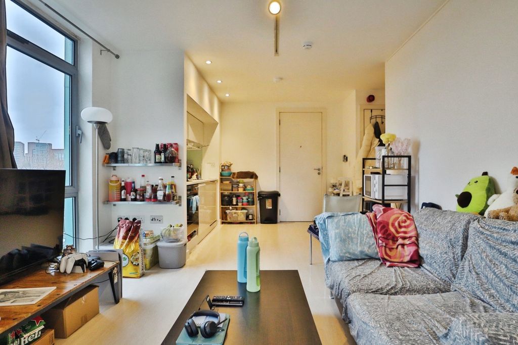 Property photo 1 of 10 Living Area