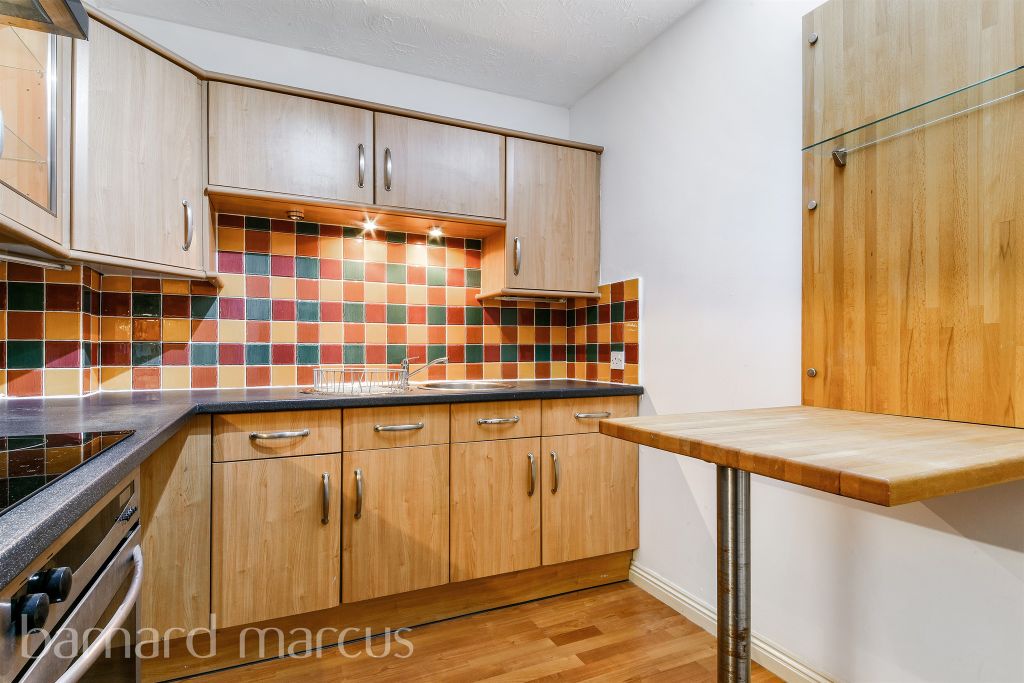 Property photo 3 of 12 Kitchen