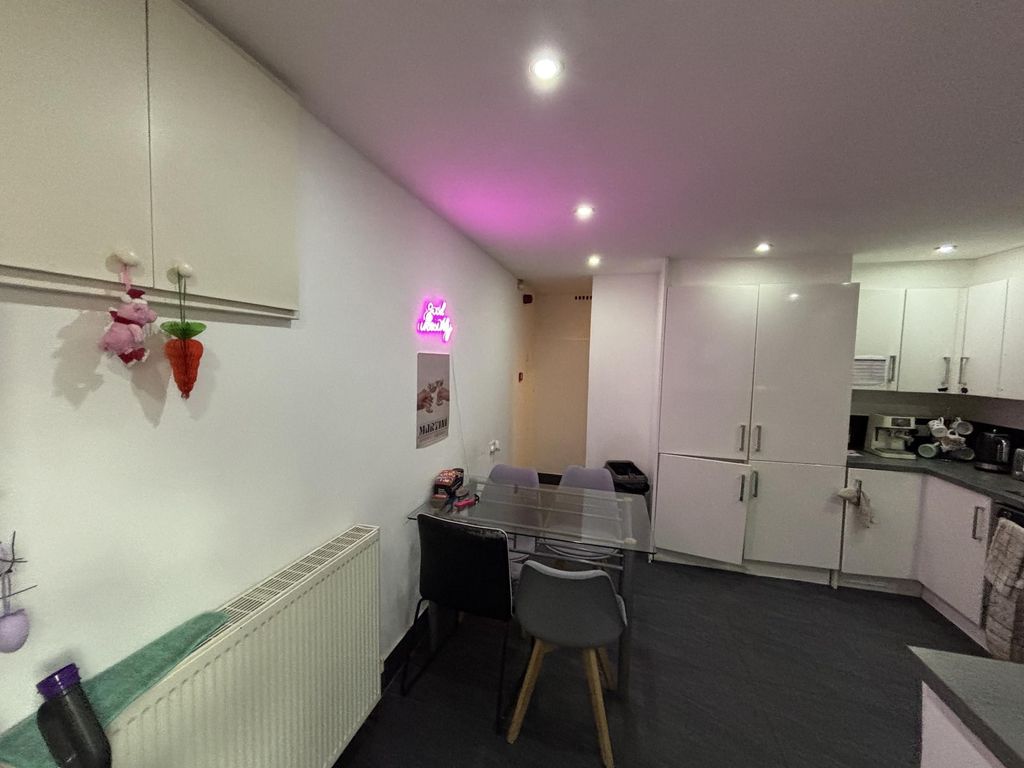 Property photo 2 of 19 A Modern And Cozy Living Room Featuring Comfortabl...