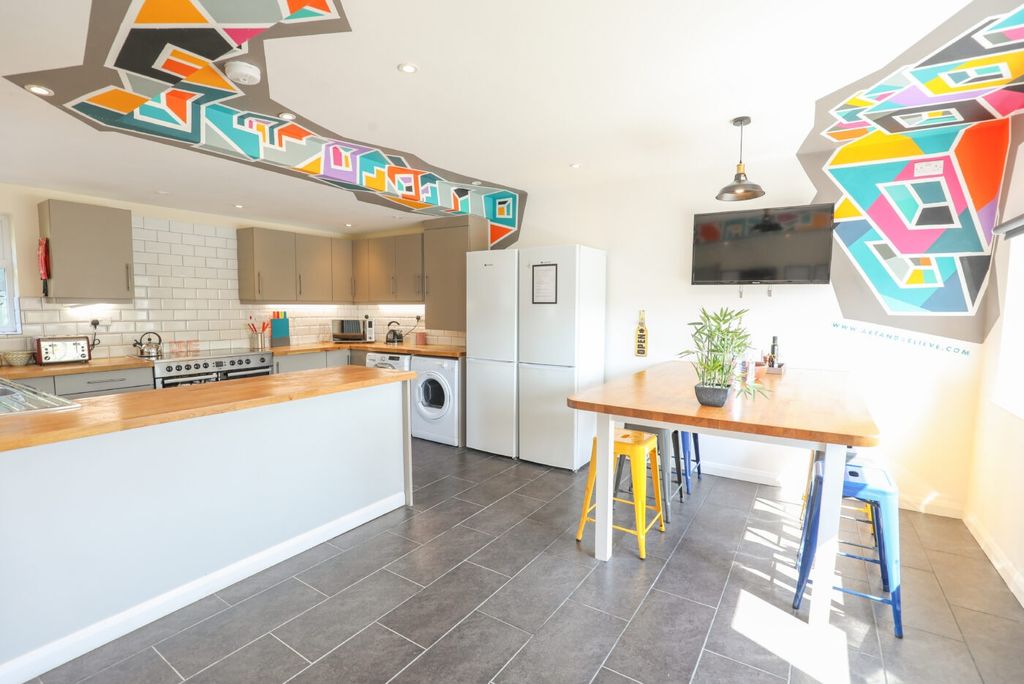 Property photo 2 of 5 Bright Modern Kitchen With A Breakfast Bar, Dining...