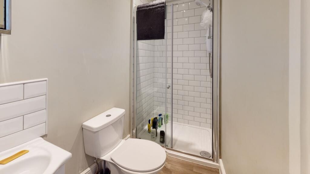 Property photo 2 of 8 This Modern Bathroom Features A Sleek Design With ...