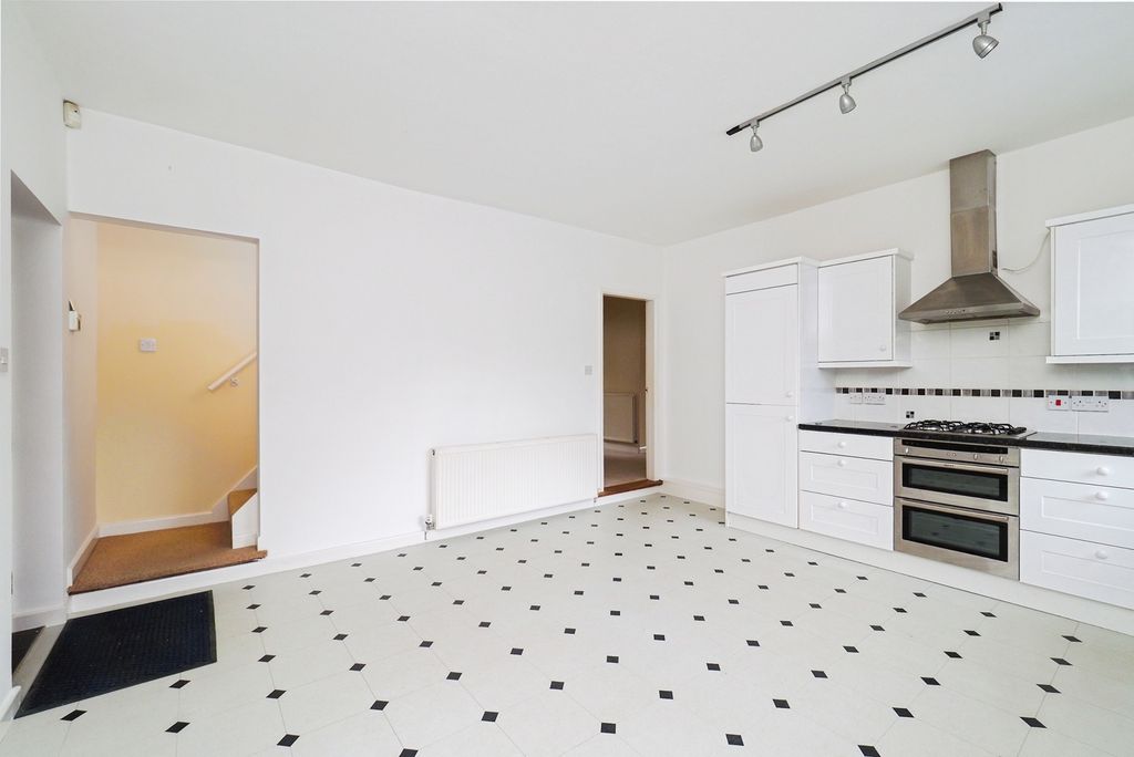 Property photo 3 of 17 Dining Kitchen