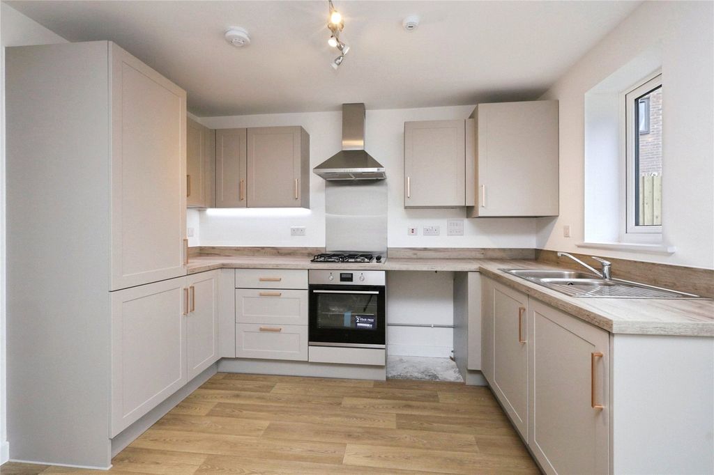 Property photo 3 of 14 Kitchen Area