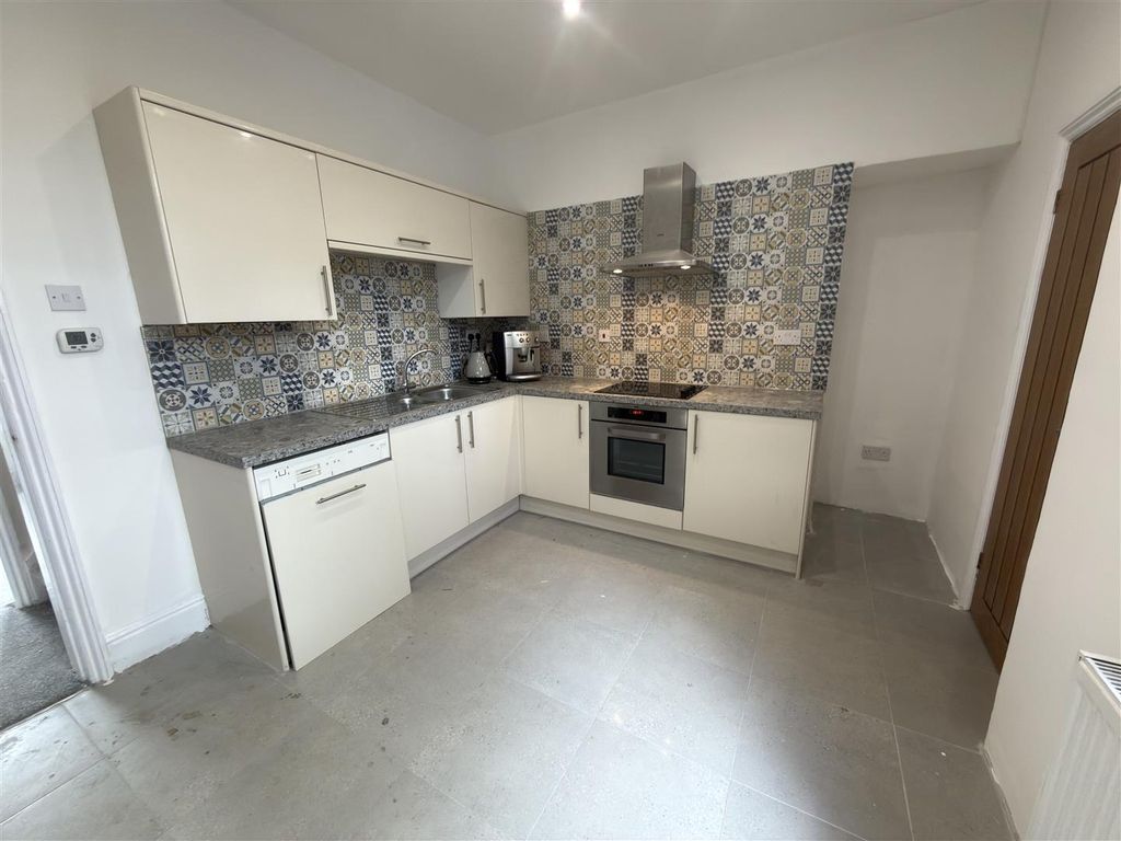 Property photo 3 of 13 Kitchen