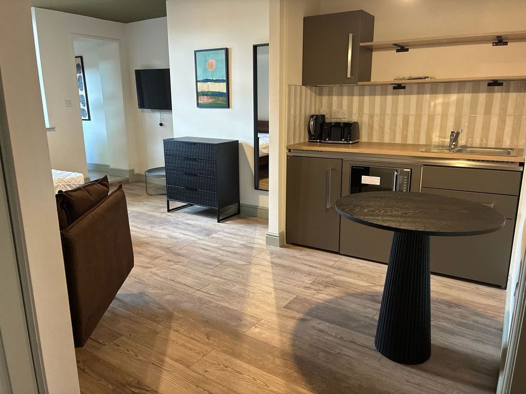 Property photo 2 of 3 Modern Studio Kitchen With Stylish Dining Area...