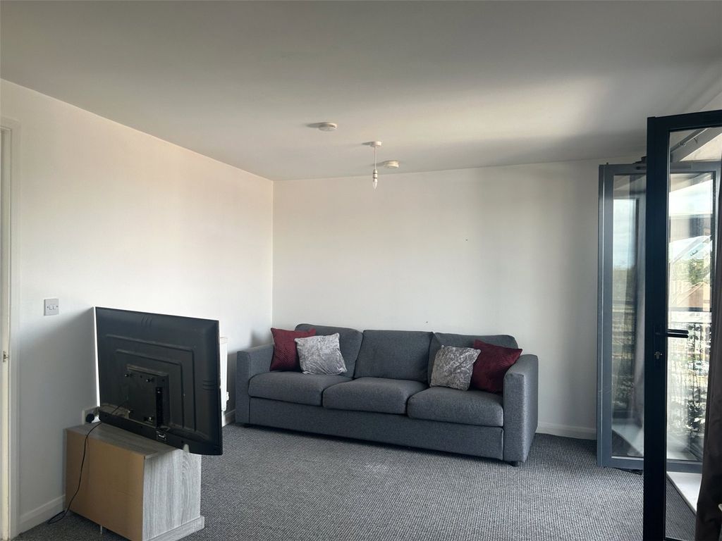 Property photo 3 of 7 Living Area