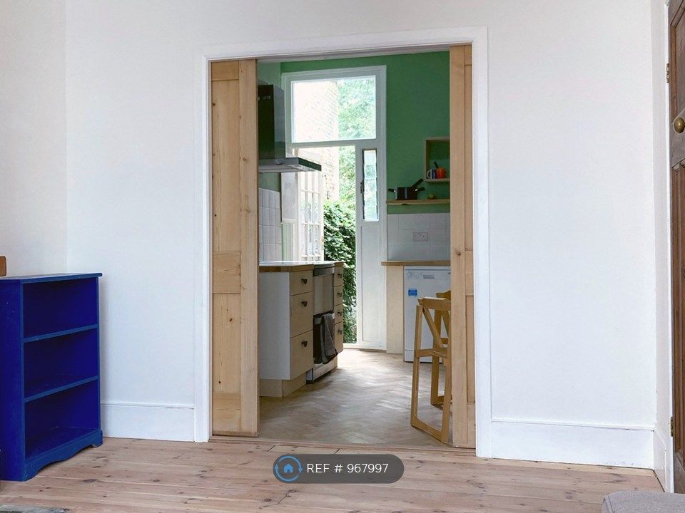 Property photo 2 of 12 Living Room Through Kitchen To Garden