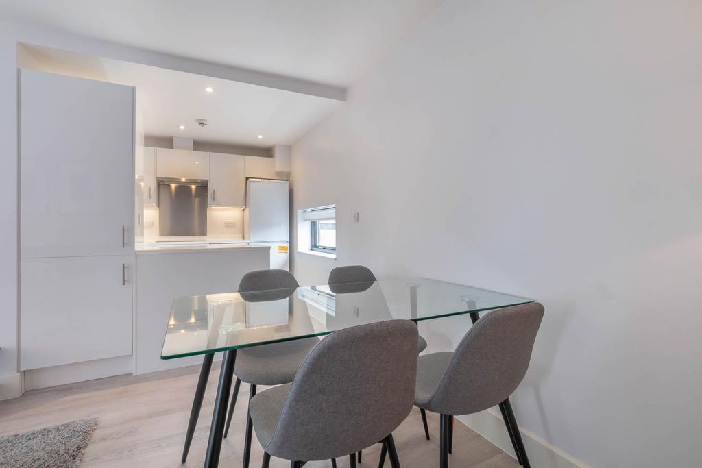 Property photo 3 of 10 Living Room/Dining Area