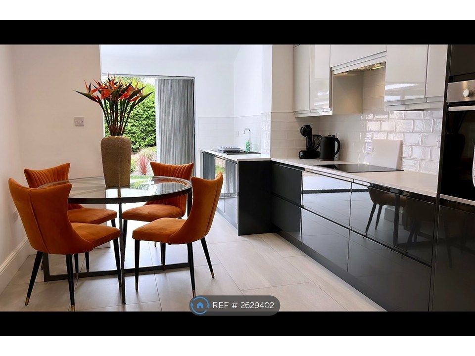 Property photo 3 of 13 Kitchen And Dining Area