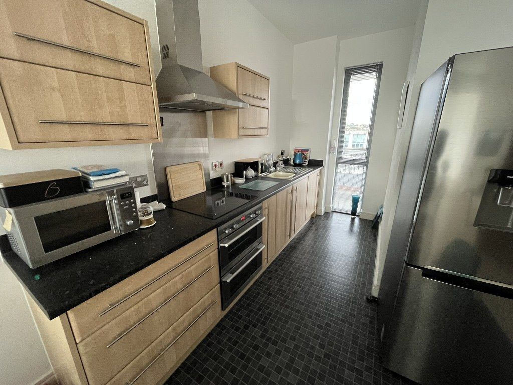 Property photo 3 of 8 Kitchen