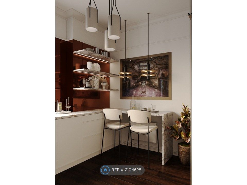 Property photo 3 of 10 Kitchen With Breakfast Bar