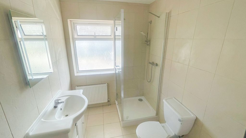 Property photo 3 of 4 Bright And Clean Bathroom Featuring A Modern Walk-...
