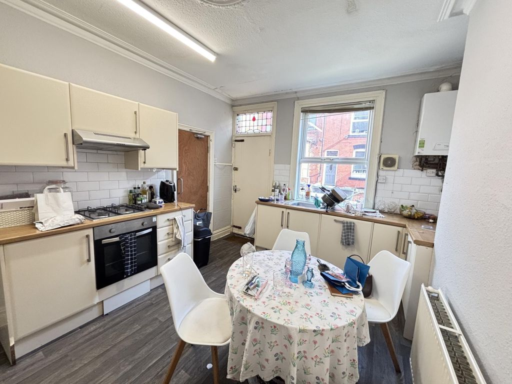Property photo 3 of 15 Bright And Welcoming Living Room With Large Window...