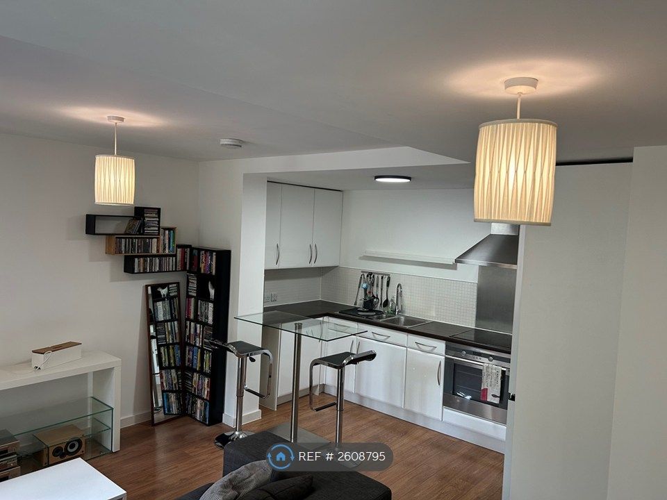 Property photo 3 of 8 Living Area With Kitchen